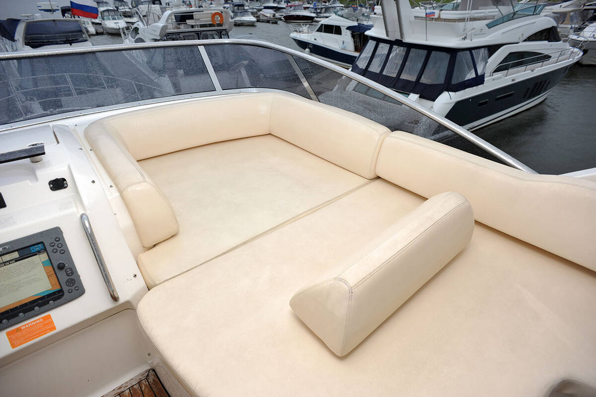A large lounger for sunbathing to the right of the control