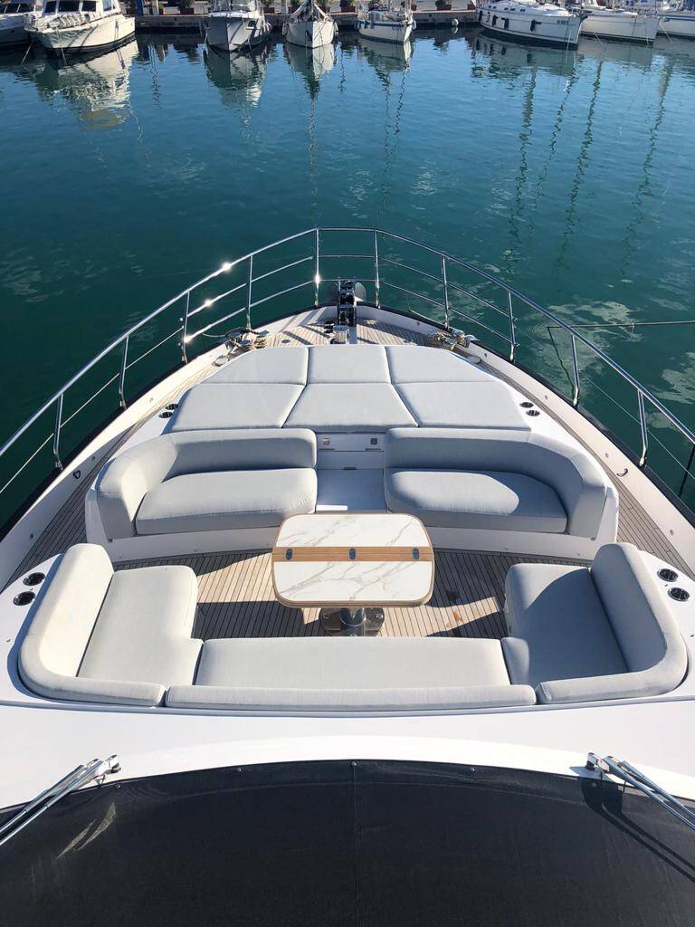 Lounge area on bow with sunbathing cushions