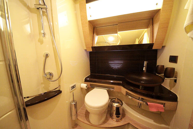 Bathroom for VIP and guest cabins. The Interior Of The Azimut 58