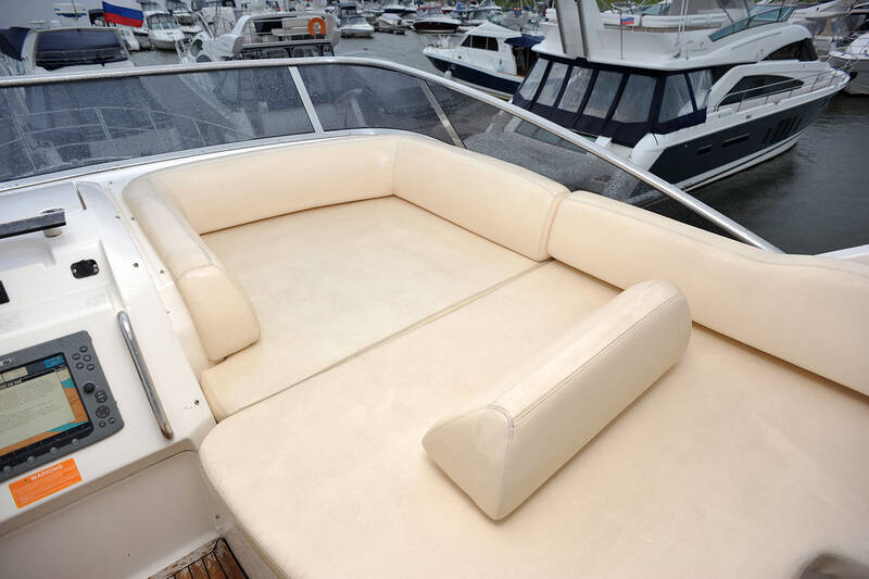 A large lounger for sunbathing to the right of the control