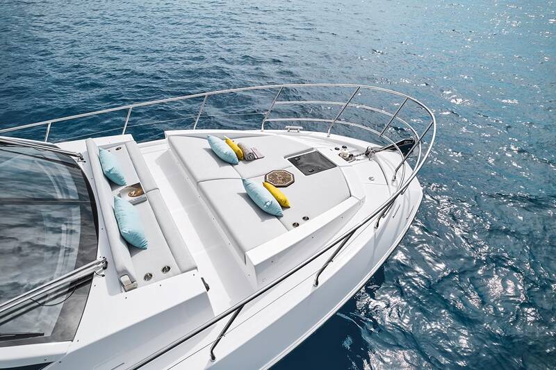 Lounge area and sunbathing cushions on bow